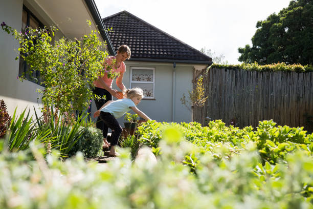 istock Mother and daughter searching for Easter Eggs 1219190787