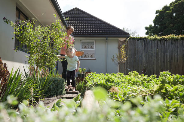 istock Hunting for Easter Eggs in the garden with my mom 1219190883