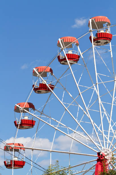 istock Ferris wheel on blue sky background 1219191238