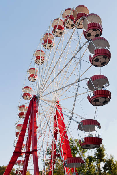 istock Ferris wheel on blue sky background 1219191300