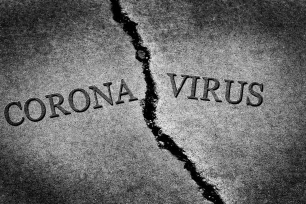 istock Old cracked sidewalk broken and dangerous cement Coronavirus Corona Virus 1219192802