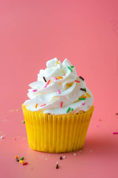 istock Homemade Birthday cupcake on pink Background. 1219192898