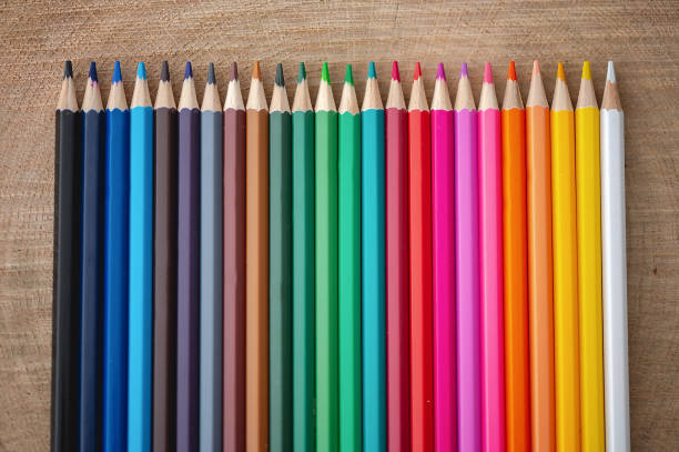 istock Rainbow of colored pencils on wood background 1219194125