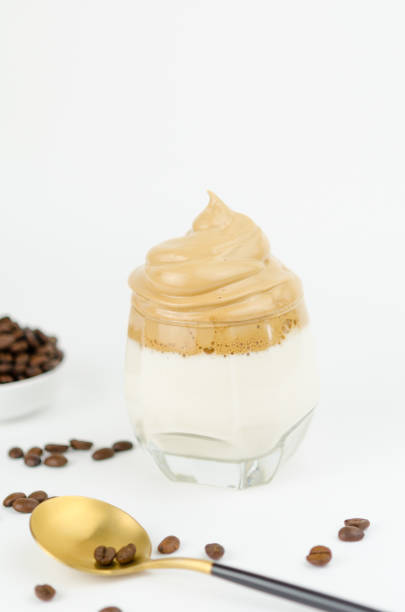 istock Dalgona frothy coffee trend Korean drink latte espresso with coffee foam on black background 1219195587