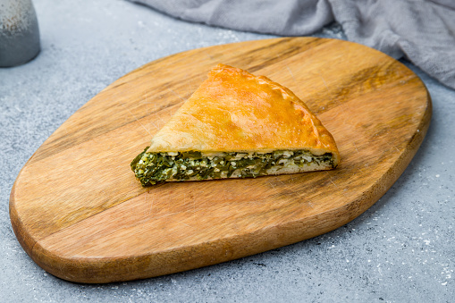 Ossetian pie with spinach and cheese, one piece
