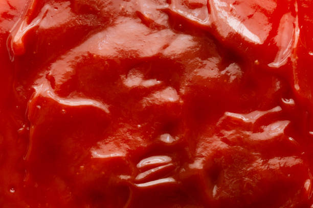istock Tomato sauce ketchup texture background close up 1219198224