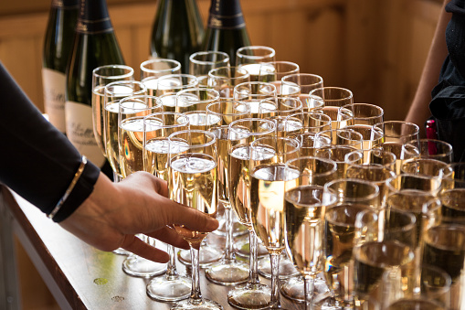 Sparkling wine glasses in the beginning of wedding reception