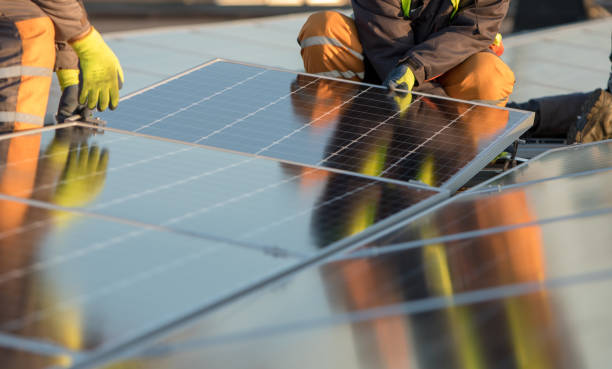 istock Solar photovoltaic modules on a rooftop 1219202600