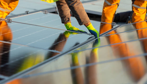 istock Solar photovoltaic modules on a rooftop 1219202728