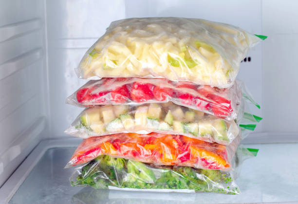 istock Frozen vegetables in a plastic bag in the freezer 1219202760