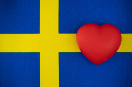 I love Sweden. Heart on the flag of Sweden. Horizontal composition with copy space.