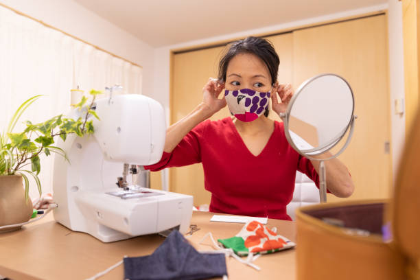Japanese woman making mask at home