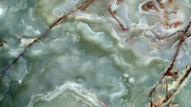 istock Green onyx tile with weaves. Background texture for design. 1219209896