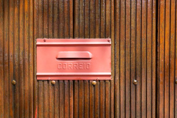 Brazilian mailbox with a wooden background.