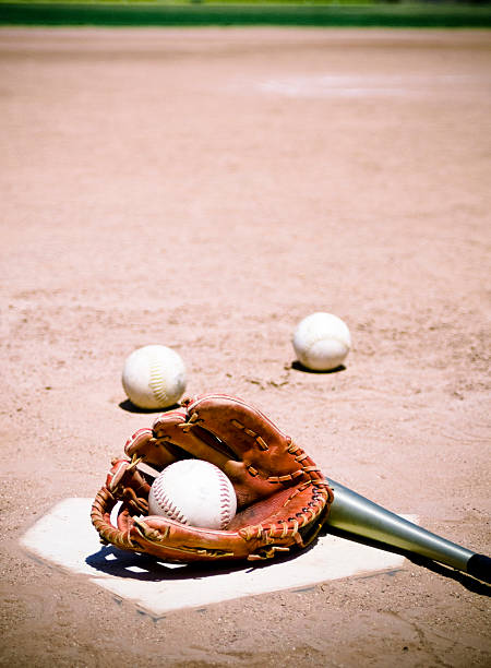 istock Softball Glove and Bat 121921760