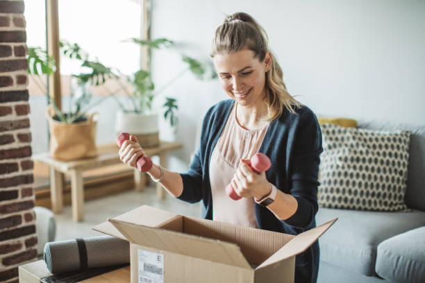 istock Unpacking workout equipment delivery in pandemic situation 1219221730