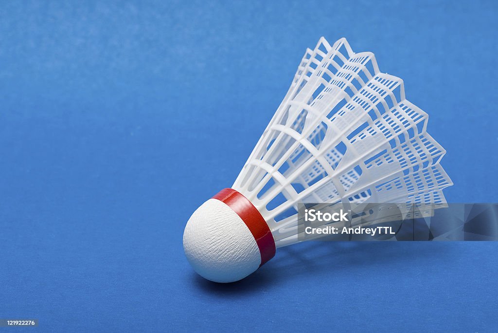 Shuttlecock on blue  Shuttlecock Stock Photo