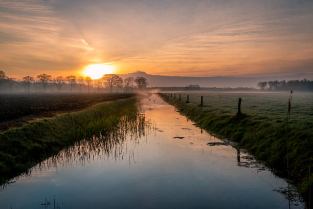 istock Beautiful sunrise in a typical Dutch landscape 1219224301
