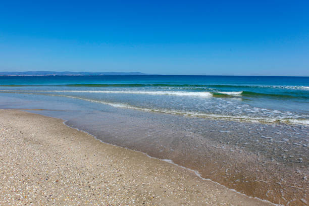 istock Beach and sea in bright sunlight 1219225645