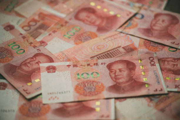 One hundred Chinese Yuan cash note background Image of China money 100 Yuan bank note background, business and finance concept. mao original stock pictures, royalty-free photos & images