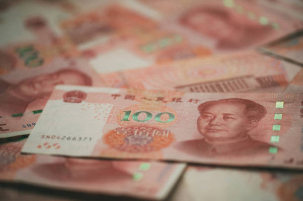 One hundred Chinese Yuan cash note background Image of China money 100 Yuan bank note background, business and finance concept. mao original stock pictures, royalty-free photos & images