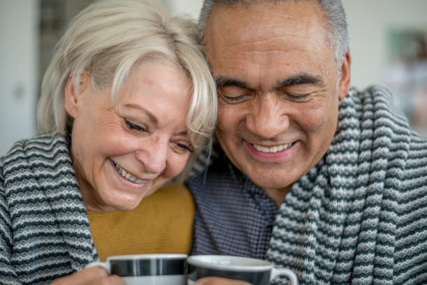 istock Senior citizen couple together at home 1219227363