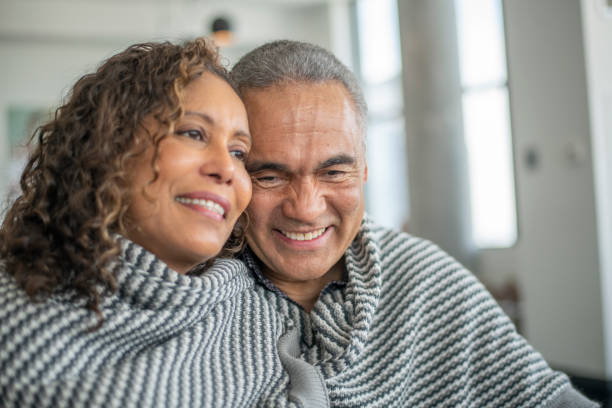 istock Senior citizen couple together at home 1219227373