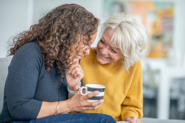 istock Two women visit together 1219227374