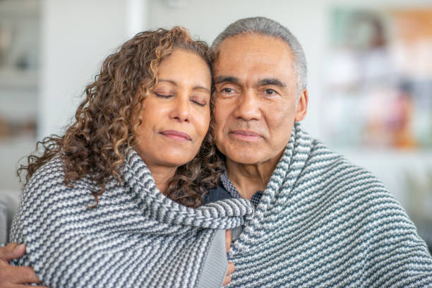 istock Senior citizen couple together at home 1219227383