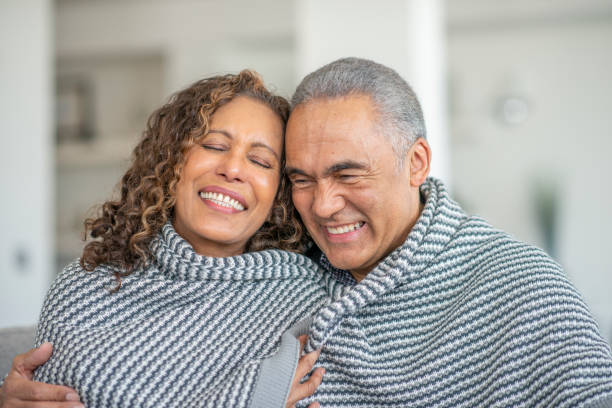 istock Senior citizen couple together at home 1219227411