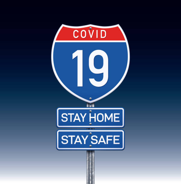 istock Interstate COVID-19 USA traffic sign with stay home stay safe message 1219227616