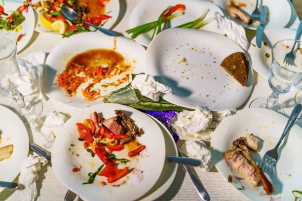 istock Empty dirty plates with spoon and forks on the table. 1219231966