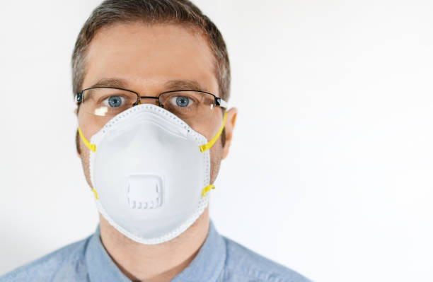 istock Man in medical mask. Place for your text. 1219235657