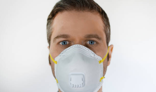 istock Man in medical mask. Place for your text. 1219235662