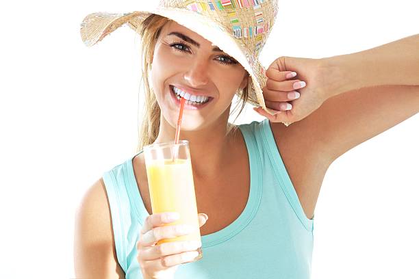 young woman with orange juice stock photo