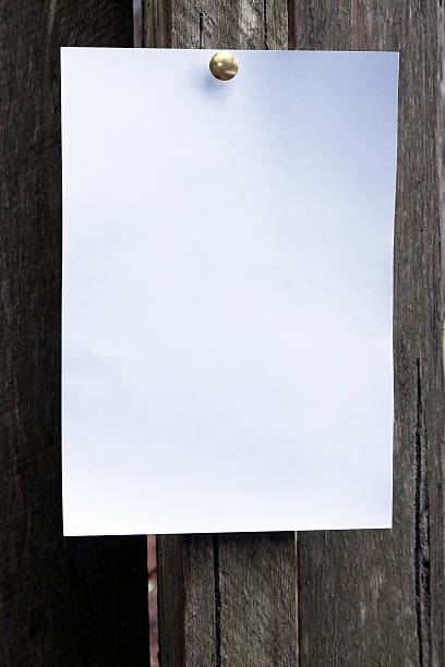 istock White empty paper pinned with thumbtuck on wood, copy space 121923822