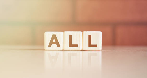 istock ALL - concept. Text on wooden cubes with bright light 1219242069