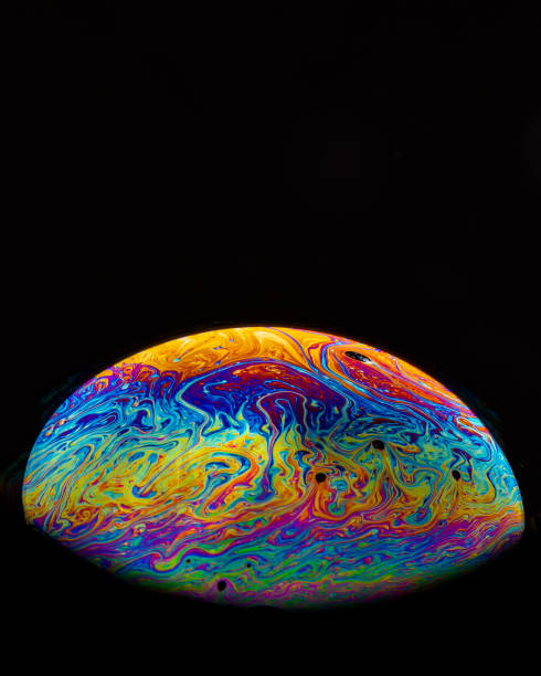 istock Explosion of colors created by soap water bubbles... 1219250544