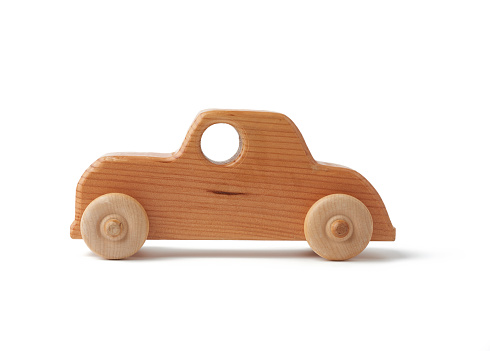vintage wooden children toy toy car with wheels isolated on white background, eco toy