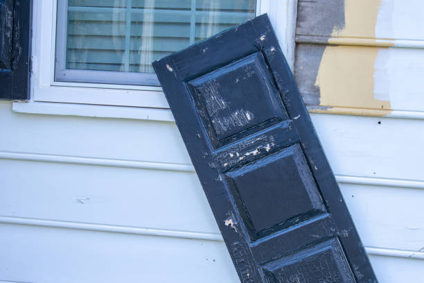 istock A Broken Outdoor Window Shutter Hanging on the Wall 1219256283