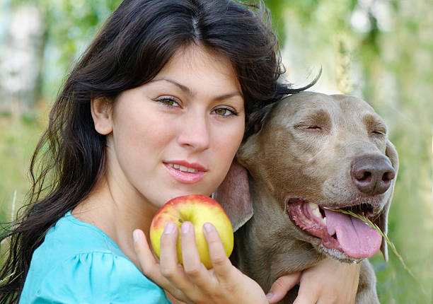 istock Young woman and dog 121925797