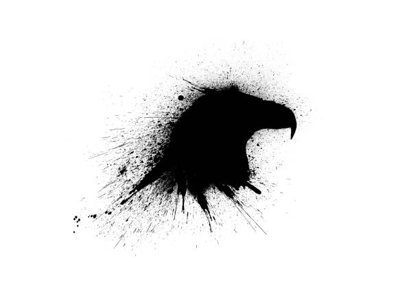 istock Black eagle head silhouette with paint splashes, splatters and blots isolated on a white background. 1219260204
