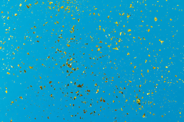istock Golden sparkles on blue pastel trendy background. 1219261325