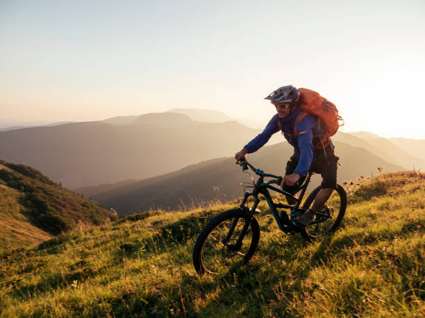 istock Riding Downhill In The Mountains At Sunset. 1219263349