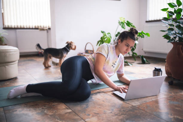 istock A Girl Preparing For Online Gymnastic Training 1219263350