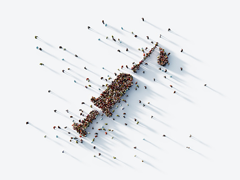 Human crowd forming syringe symbol on white background. Horizontal composition with clipping path and copy space. Vaccination concept.