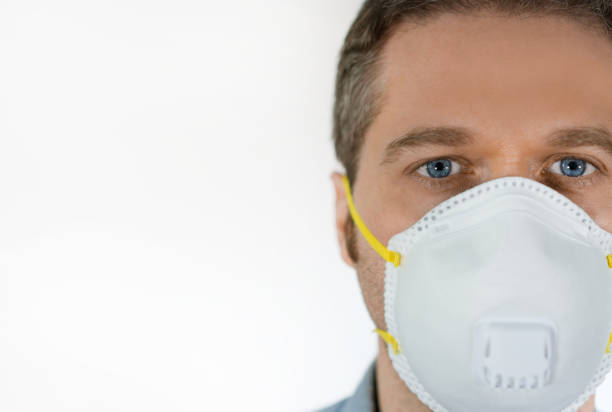 istock Man in medical mask. Place for your text. 1219272961