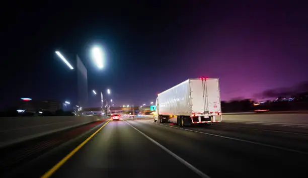 Photo of Truck Miami Florida highway at night with deliveries