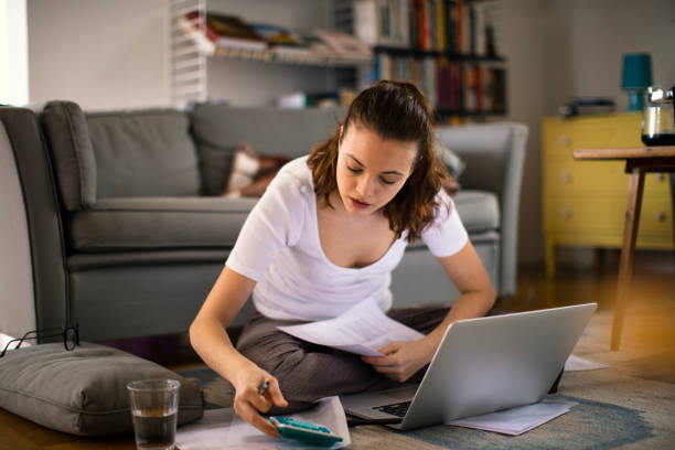 istock Young woman working from home 1219277052
