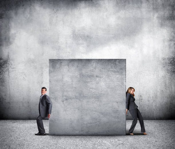 istock Business People Working Against Each Other 1219281434